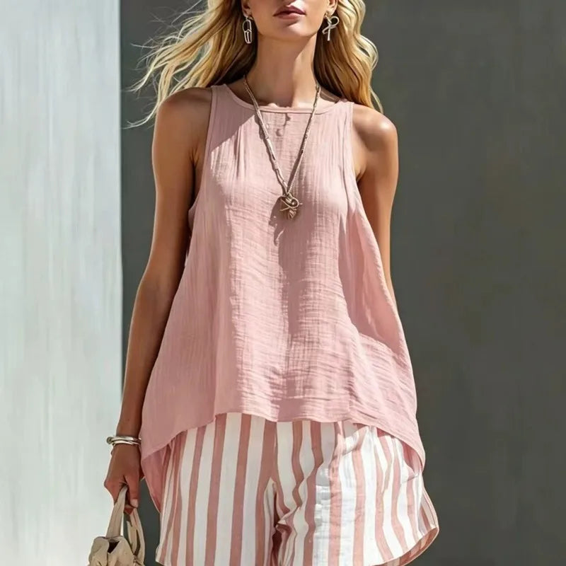 Versatile women's summer outfit: relaxed striped sleeveless tank & shorts. Great for beachwear or casual days.