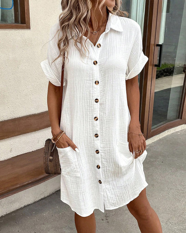 Chic women's midi dress for summer, featuring a comfortable relaxed fit and versatile design for day-to-night.