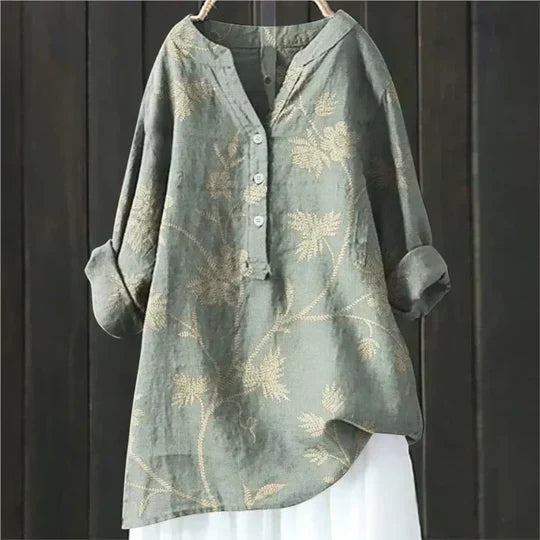 Womens relaxed fit short sleeve top, an easy wear blouse offering comfort and stylish versatility.