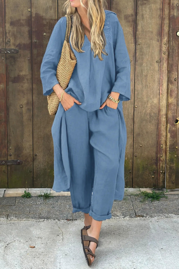 Stylish women's pant set and longline tunic, designed for a relaxed fit, suitable as loungewear or a casual outfit.
