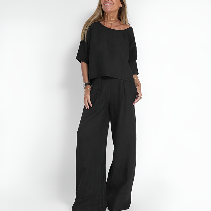 Stylish women's two-piece matching set, relaxed fit for summer or vacation. Includes breathable top & wide-leg pants.