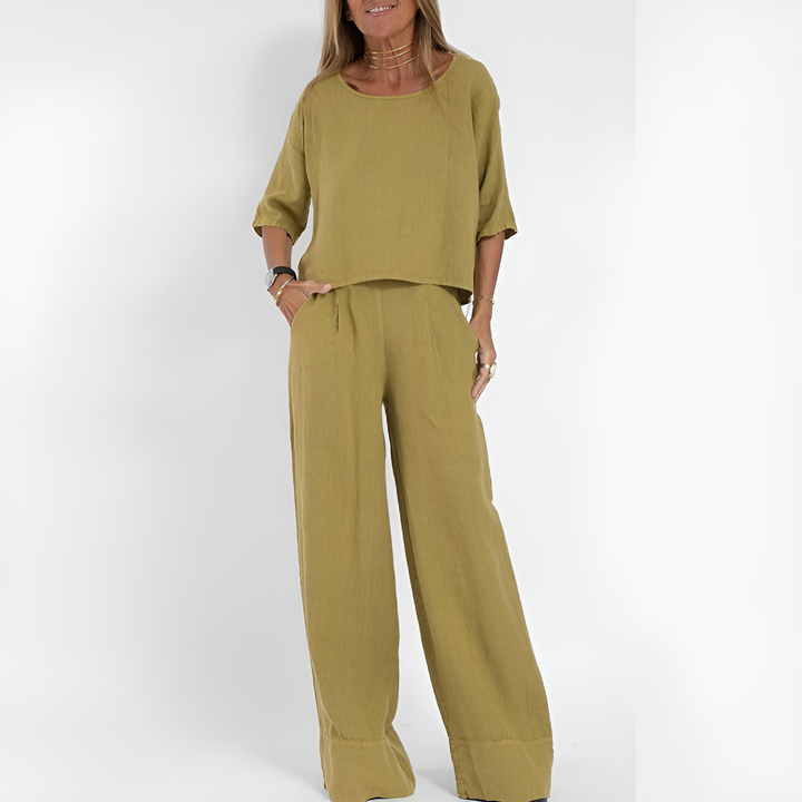 Woman wearing a relaxed two-piece loungewear set with wide-leg pants, perfect for comfortable summer casual wear.
