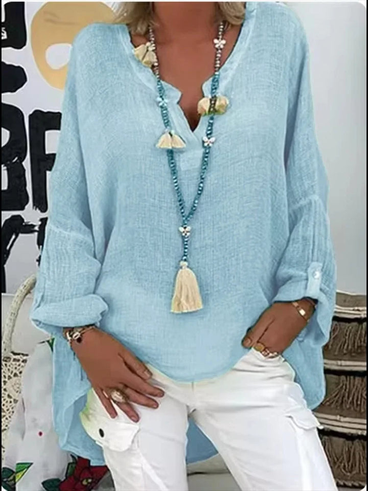 Women's relaxed fit V-neck long sleeve blouse, versatile for casual wear or office work.