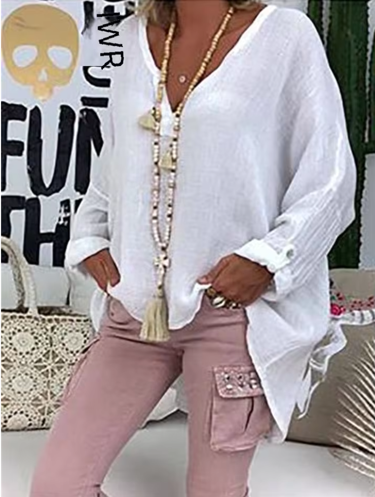 Comfortable women's relaxed fit V-neck long sleeve blouse, a versatile top for any occasion.