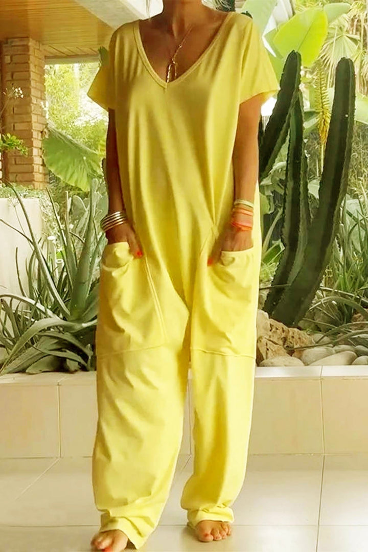 Comfortable women's one-piece relaxed fit V-neck short sleeve jumpsuit, featuring a trendy dropped crotch.