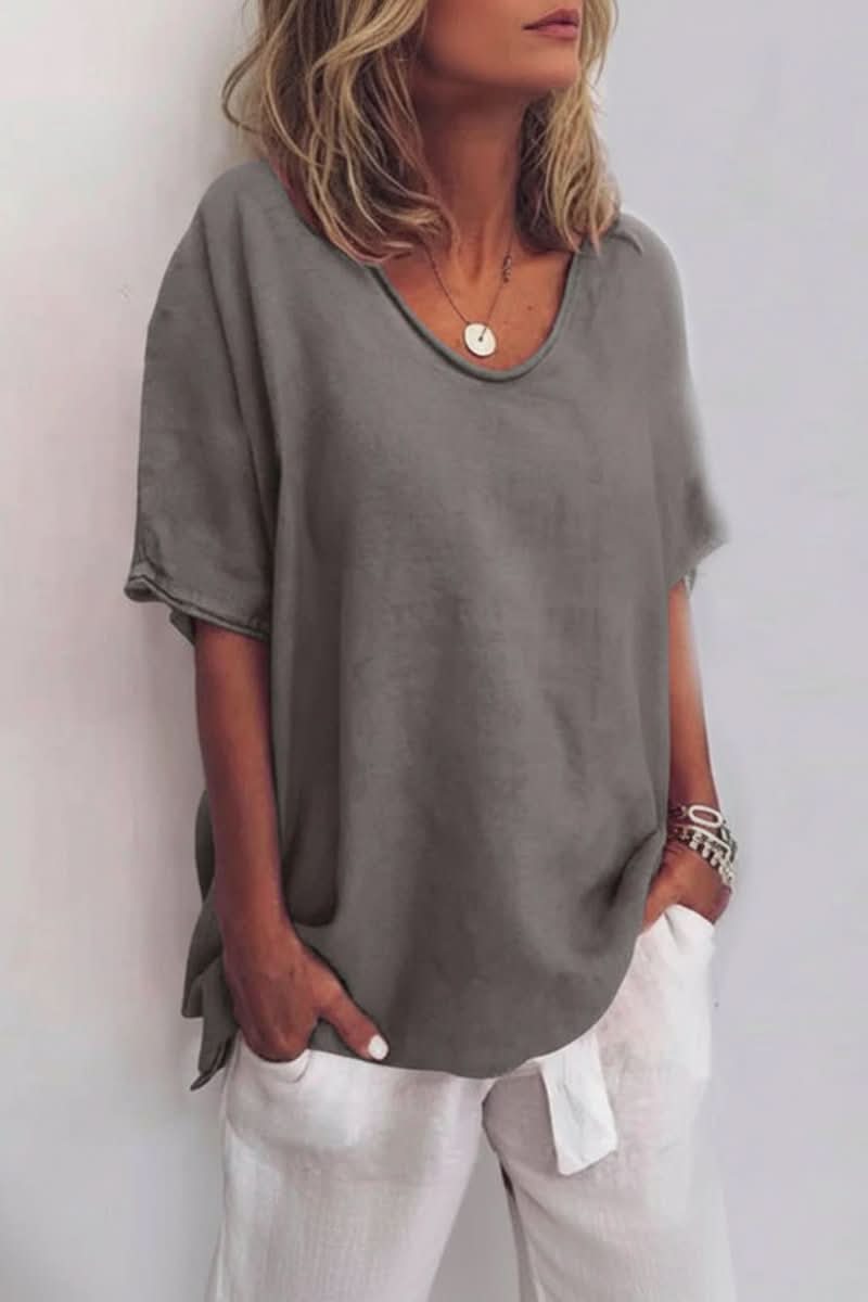 Versatile women's V-neck summer top, relaxed fit, great for comfortable and casual everyday fashion.