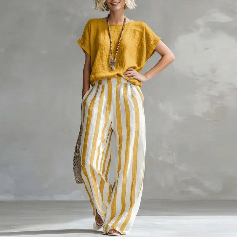 Women's relaxed linen blend two-piece summer set with wide-leg pants & short-sleeve top. Perfect for resort wear.