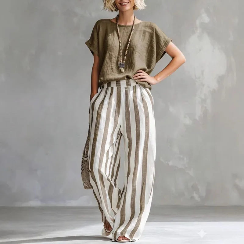 Striped women's linen blend summer set with comfortable wide-leg pants & short-sleeve top, ideal for beachwear.