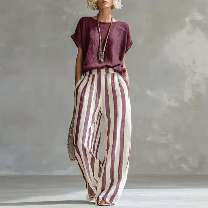 Lightweight linen blend summer set for women, featuring relaxed wide-leg pants & a breathable short-sleeve top.