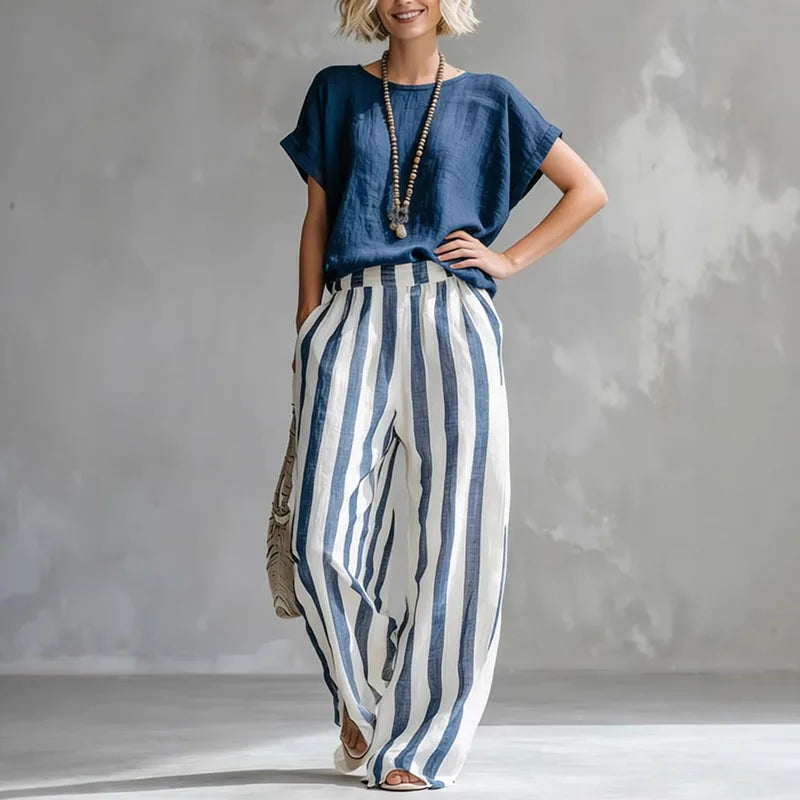 Relaxed women's linen blend set with comfy wide-leg pants & short-sleeve top. Perfect casual summer outfit.