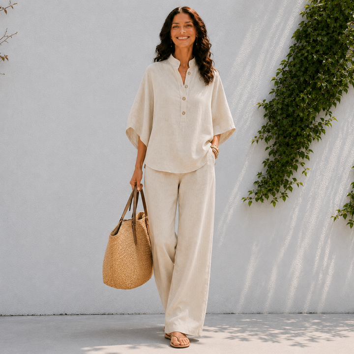 Women's relaxed oversized blouse & wide leg pants matching set, perfect comfortable travel outfit.