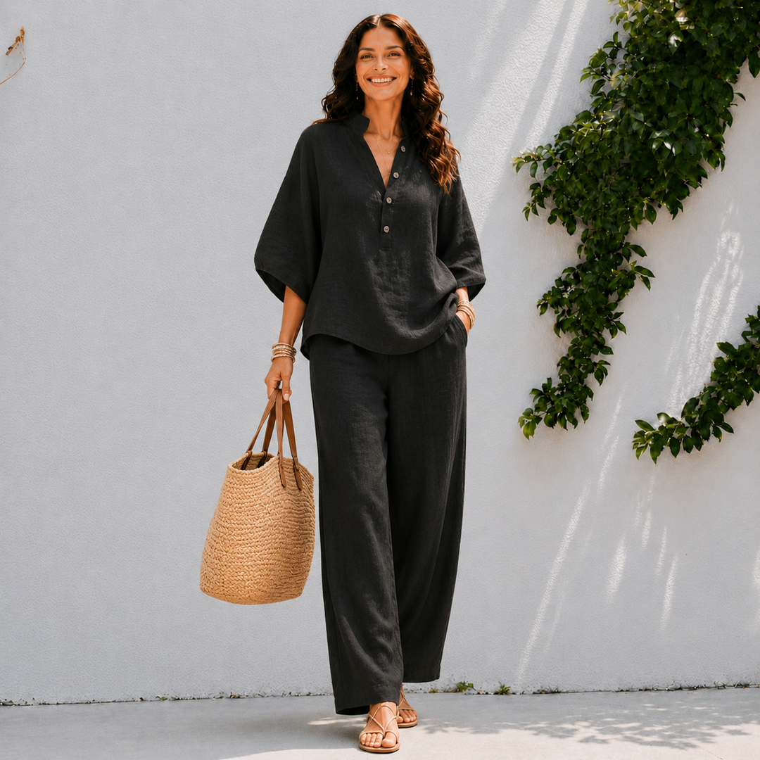 Chic women's two-piece set for summer. Relaxed oversized blouse and wide leg pants, great for travel & casual.