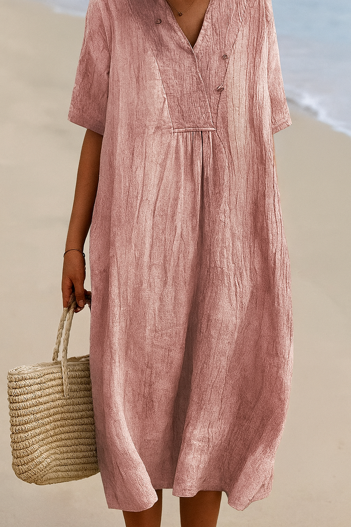 Stylish women's flowy beach dress with V-neck and short sleeves, ultimate relaxed comfort.