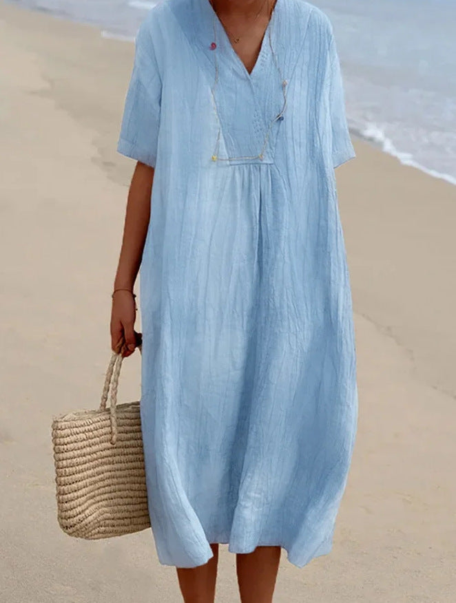Versatile women's relaxed V-neck short sleeve dress, perfect as a beach cover-up or casual wear.