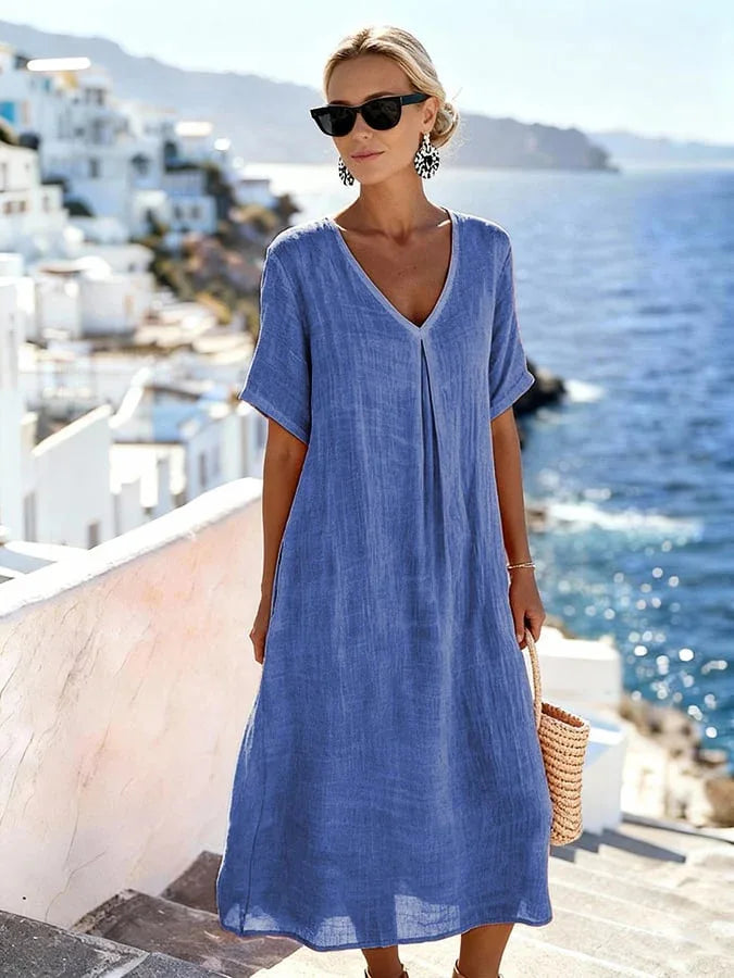 Summer-ready women's midi dress, relaxed V-neck, short sleeves, comfortable everyday outfit.