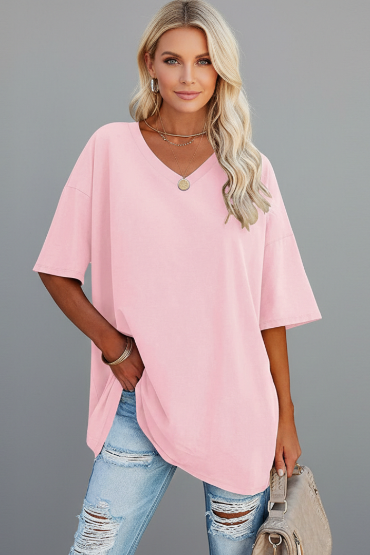 Women's casual wear: V-neck t-shirt, short sleeves, loose fit for effortless comfort.