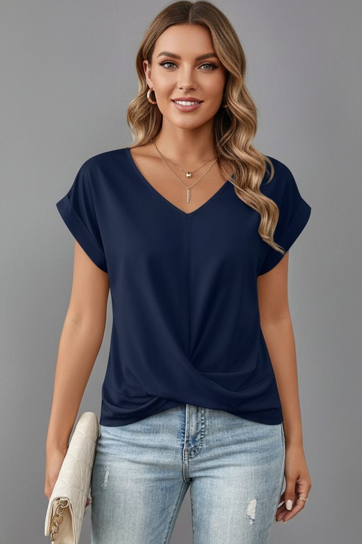 Everyday women's fashion: relaxed V-neck blouse, short sleeve, easy pull-on style.