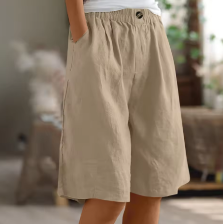 Modern chic women's wide leg Bermuda shorts, high-rise and relaxed fit for summer styling.