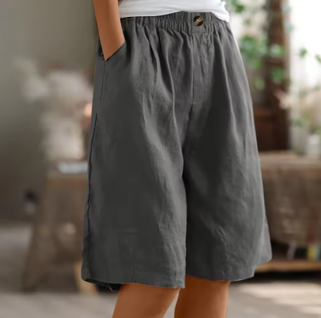 Comfortable women's Bermuda shorts with elastic waist, wide leg & relaxed fit for summer.