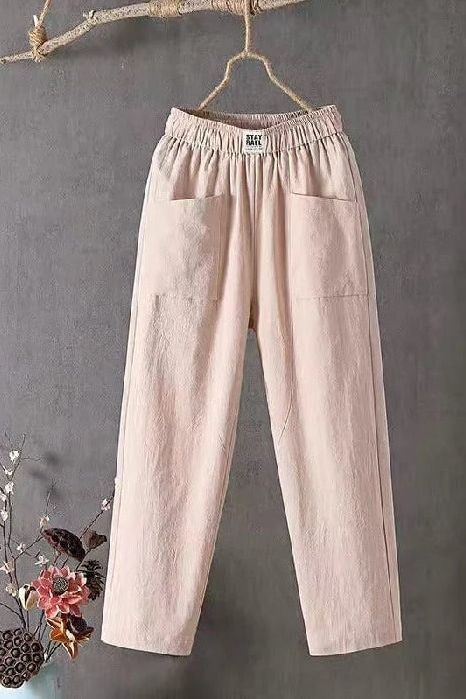 Women's wide-leg pants featuring an elastic waist & relaxed, loose fit. Comfortable for everyday casual style.