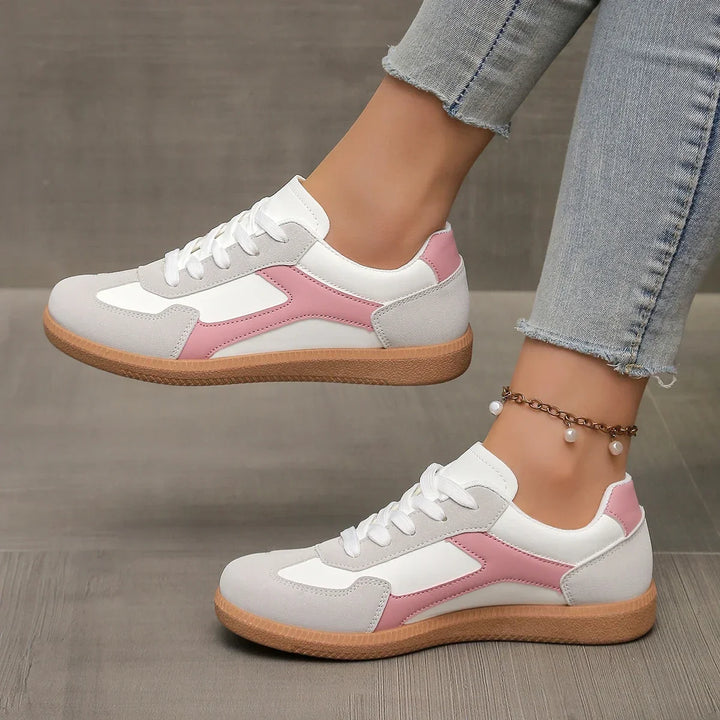 Women's retro low profile sneakers with cushioned gum sole, perfect for comfortable everyday casual wear.