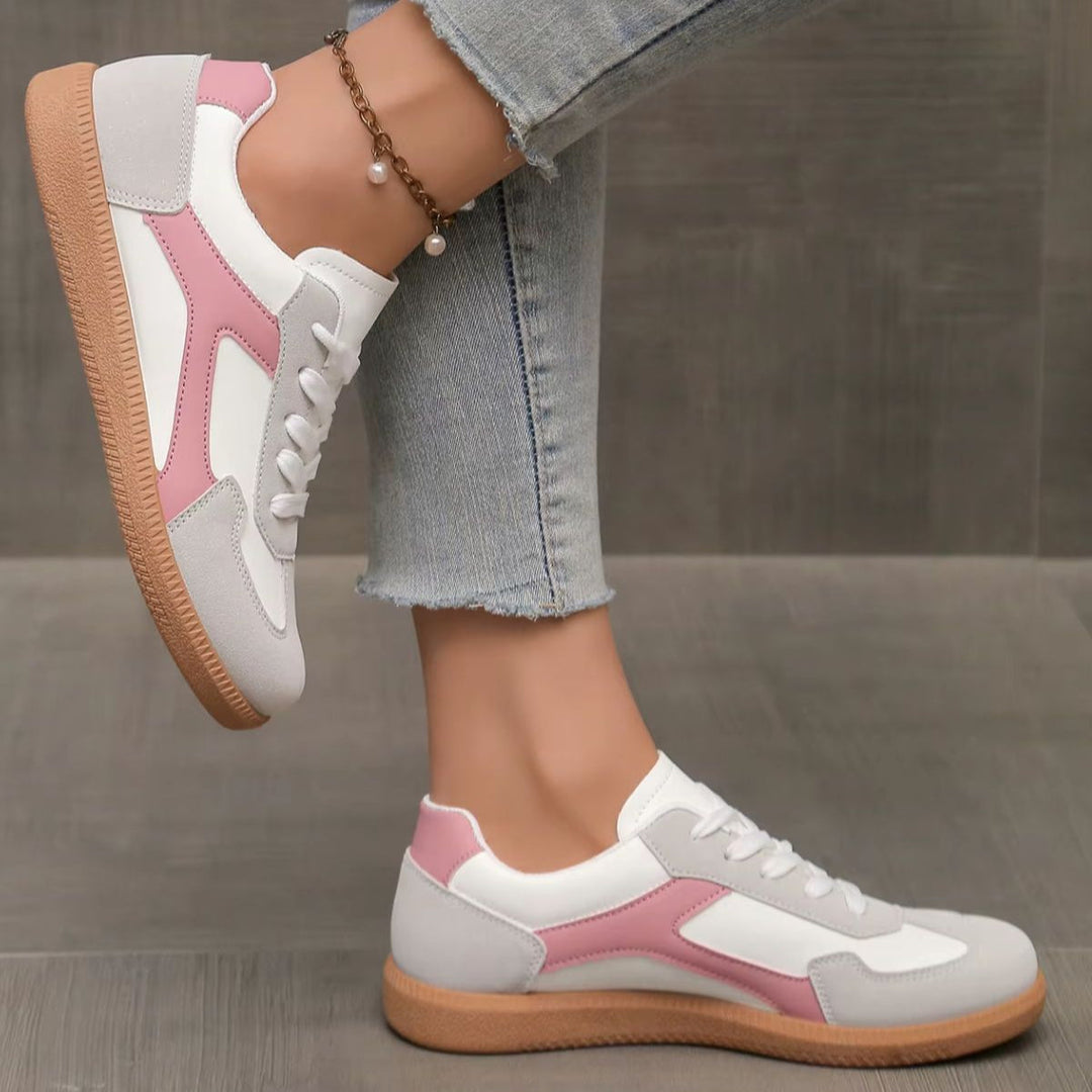 Stylish women's low top retro sneakers, featuring a comfortable cushioned design and versatile gum sole.