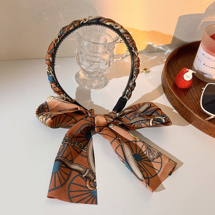 Accessorize with this elegant retro ribbon hairband, a perfect choice for women's braiding needs.