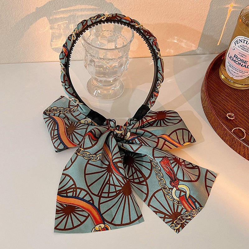 Unleash your creativity with this retro ribbon hairband, designed for easy women's hair braiding.