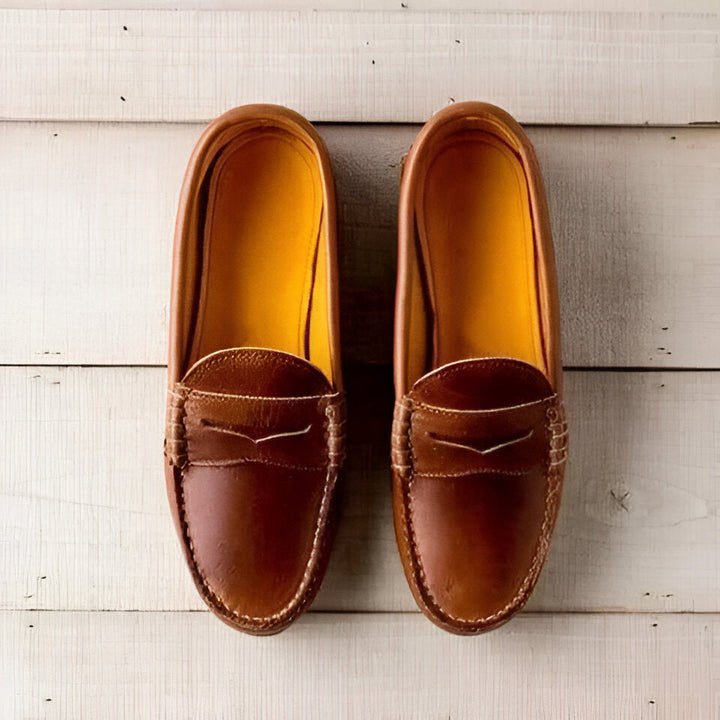 Comfortable women's retro slip-on loafers. Low heel, round toe, perfect vintage style casual footwear for daily wear.