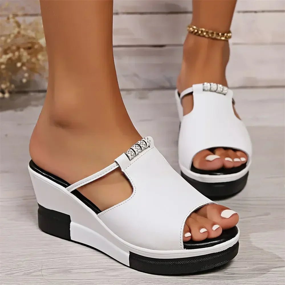 Comfortable women's slip-on wedge sandals featuring sparkling rhinestones and a trendy platform design.