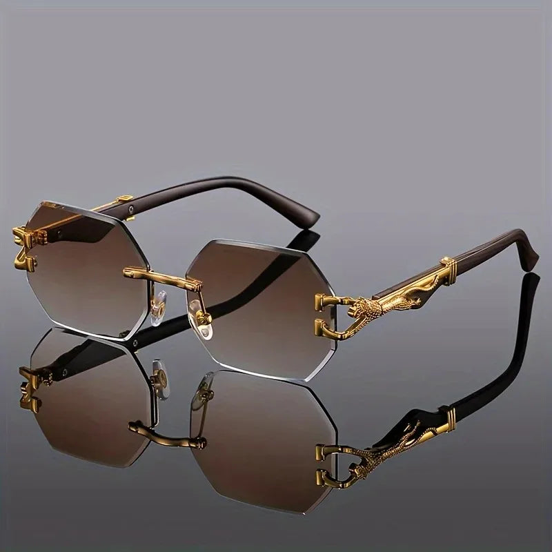 Chic women's luxury eyewear: geometric rimless sunglasses with stunning gold panther detail. Gradient lenses.