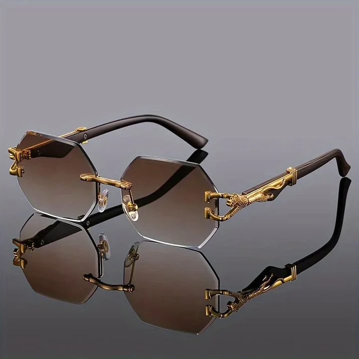 Chic women's luxury eyewear: geometric rimless sunglasses with stunning gold panther detail. Gradient lenses.