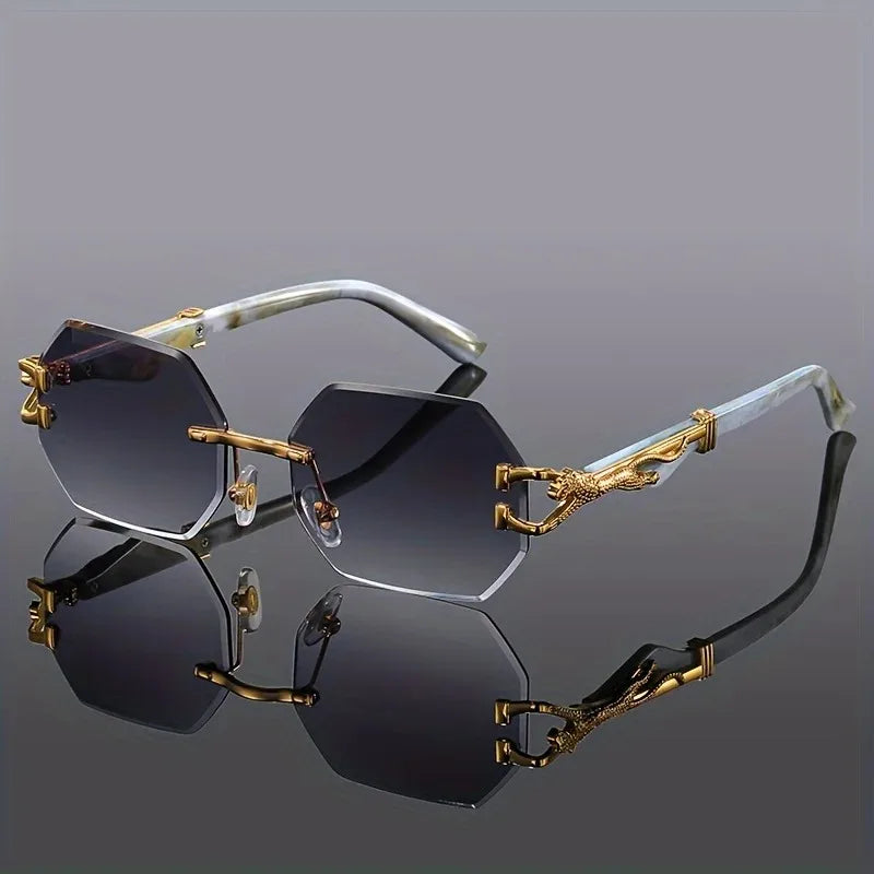 Women's geometric rimless sunglasses with gold panther hardware. Luxury fashion, UV protection & chic style.