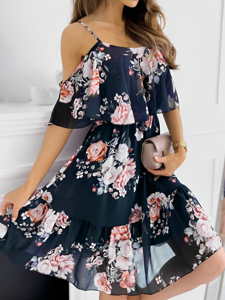 Versatile women's floral mini dress, cold shoulder design, can be dressed up or down for any occasion.