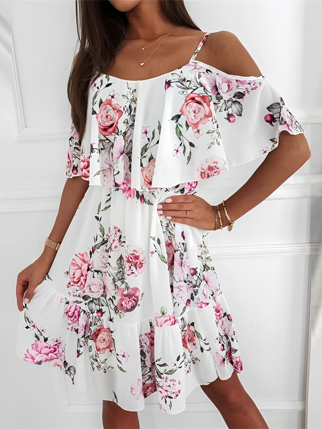 Flowy floral cold shoulder mini dress for women, excellent vacation wear or casual beach resort attire.