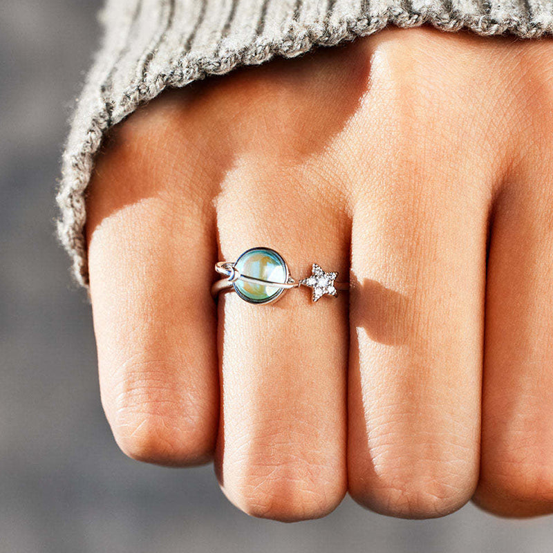 Adjustable copper anxiety ring featuring rotatable moon and star for stress relief, women's accessory