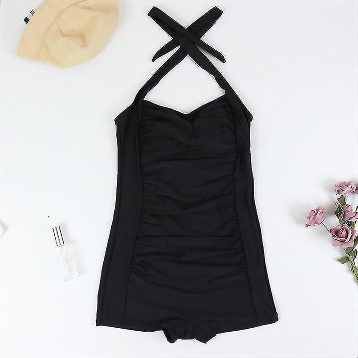 Classic women's ruched halter one-piece swimsuit, sweetheart neckline, and boyleg for a flattering summer look.