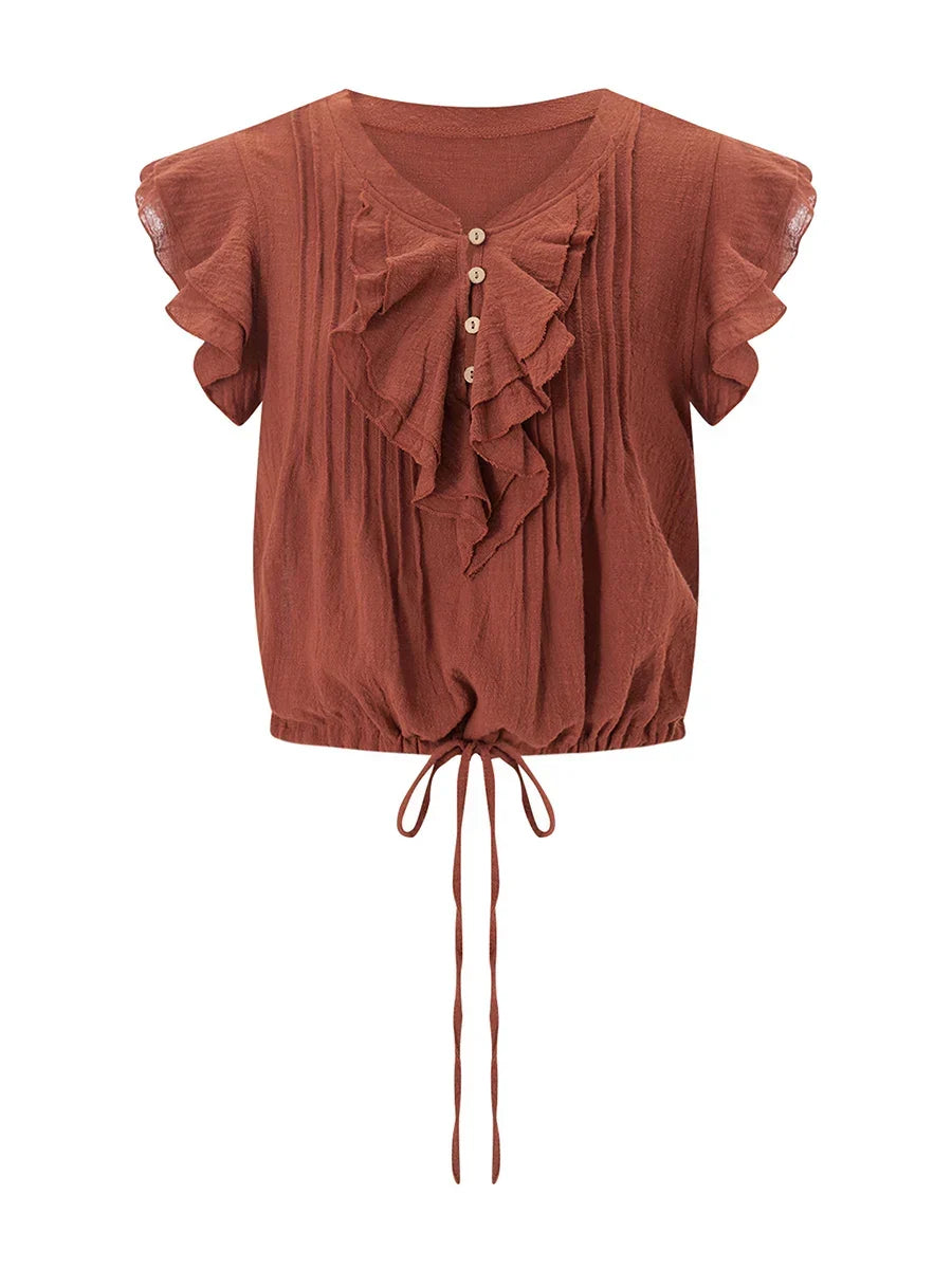 Trendy women's ruffle crop top for summer, offering a light and breezy casual fashion look.