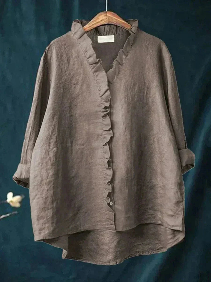 Casual women's summer blouse with ruffle neck, relaxed fit, and lightweight fabric for ultimate comfort.