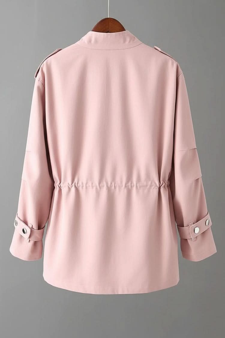Front image of a women's rugged utility jacket with a distinctive chic open back, great for casual elegance.