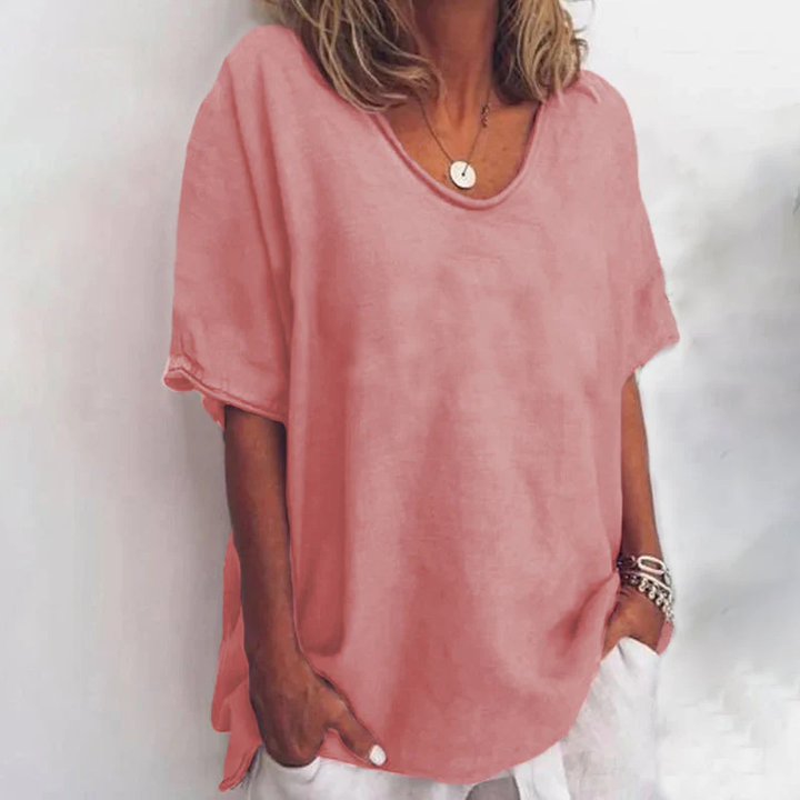 Women's scoop neck loose blouse in a solid color, perfect for effortless style and everyday comfort.