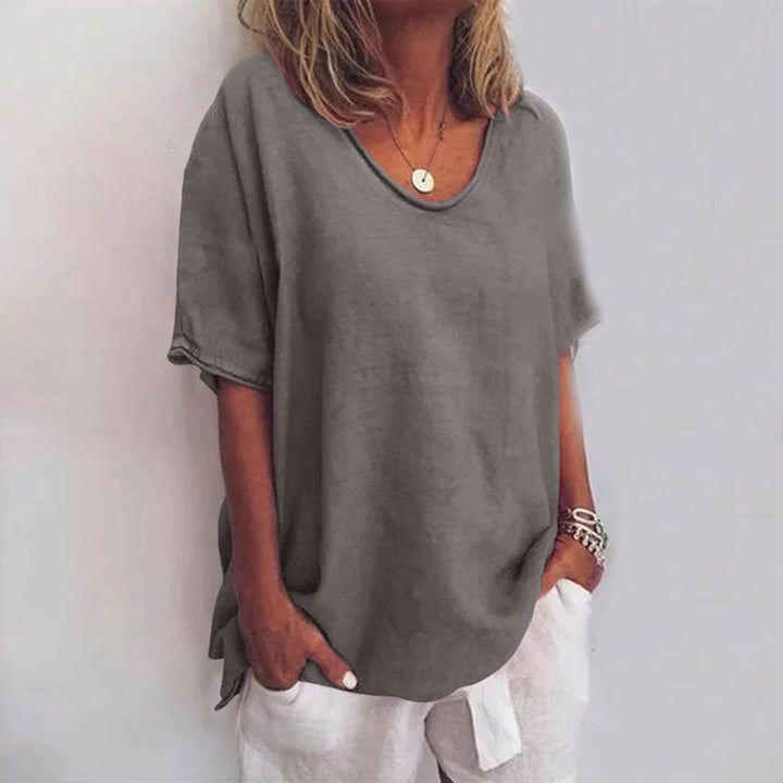 Versatile women's casual scoop neck top in a loose fit, offering ultimate comfort for any occasion.