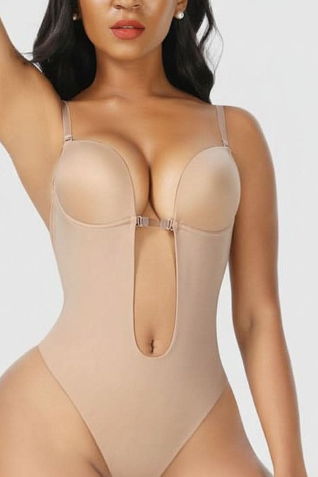 Beige seamless backless body shaper for women, creating smooth curves & invisible under clothing.