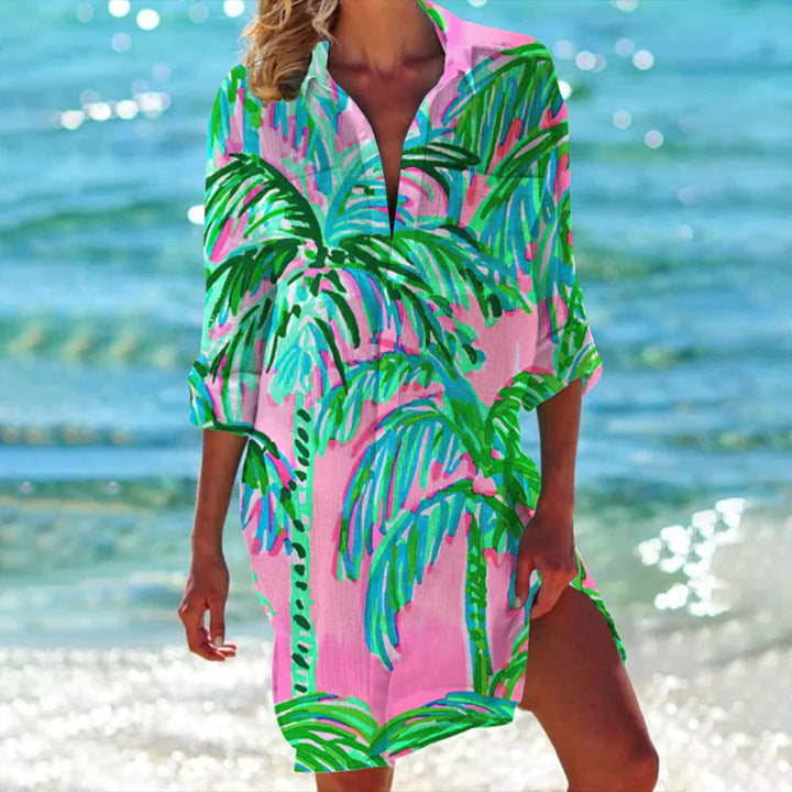 Casual women's seashell print long tunic shirt dress. 3/4 sleeves, light beachwear for summer vacation.