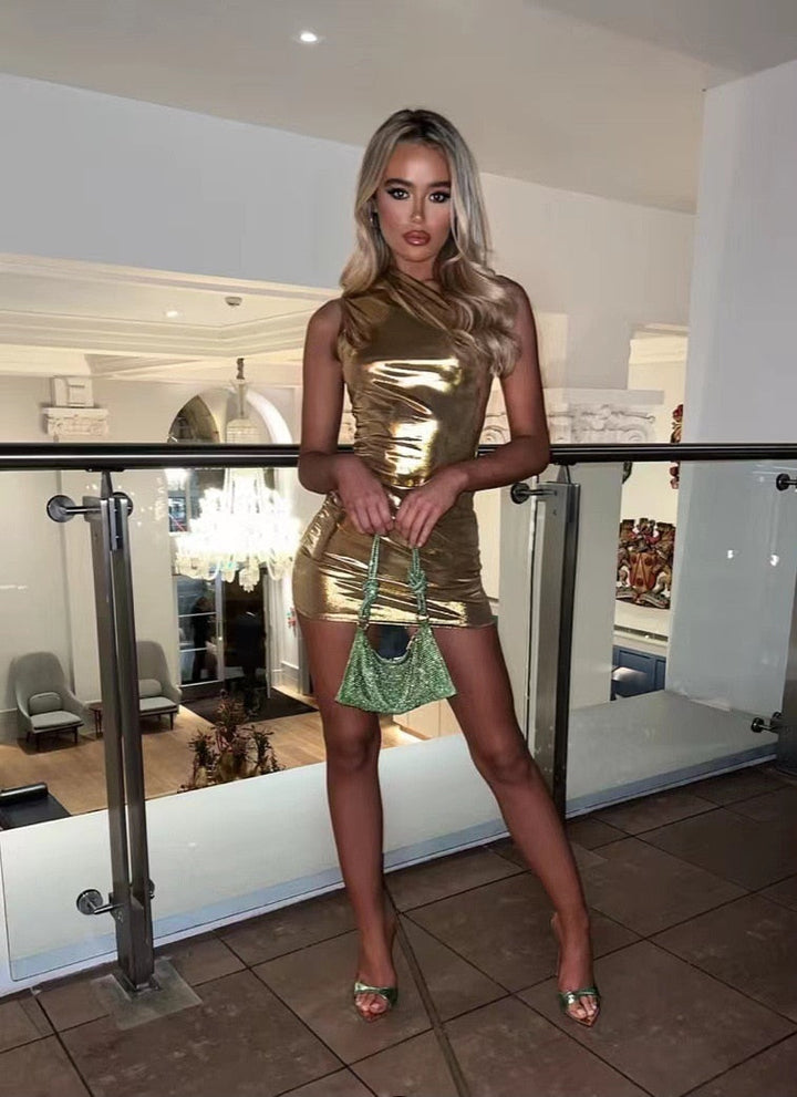 Glamorous women's metallic mini dress. Shimmering sleeveless design, perfect for parties, evening events & fashion.
