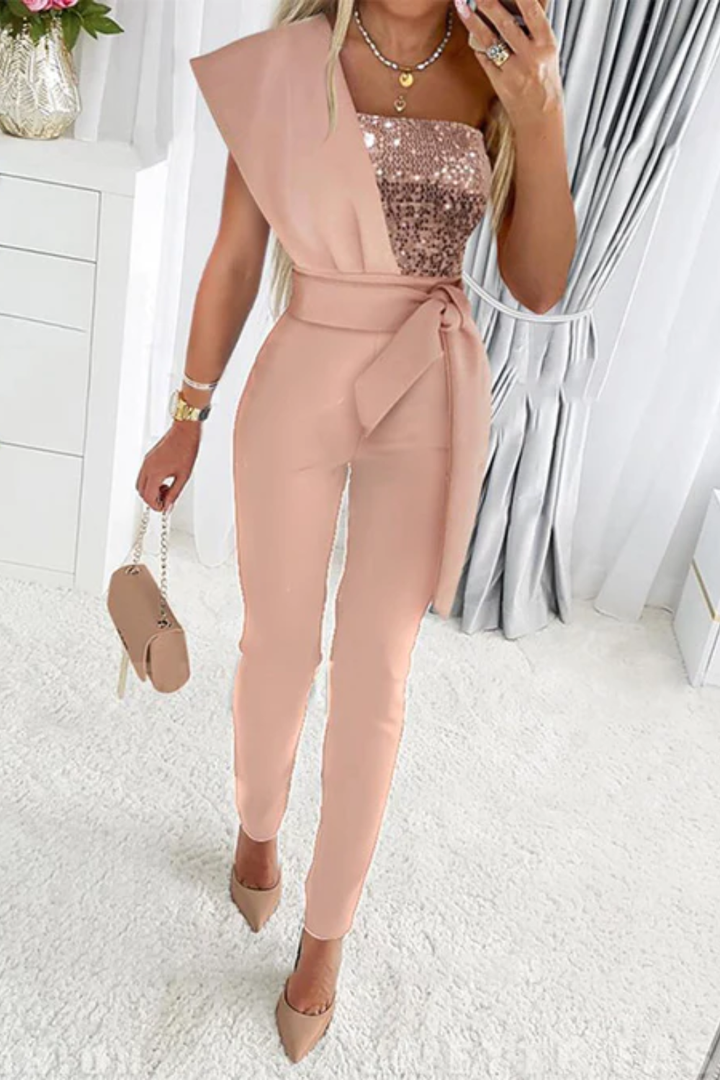 Glamorous women's sequin jumpsuit, ideal party outfit. An elegant cocktail dress alternative for night outs.