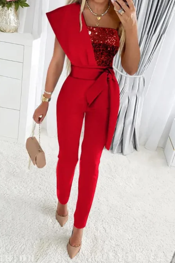 Elegant women's sequin jumpsuit, a glamorous choice for parties, night outs & sophisticated evening wear.