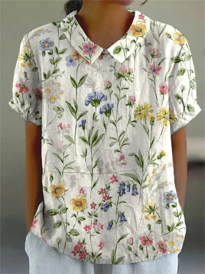 Elegant women's collared floral print short sleeve blouse, ideal for stylish spring and summer wear.