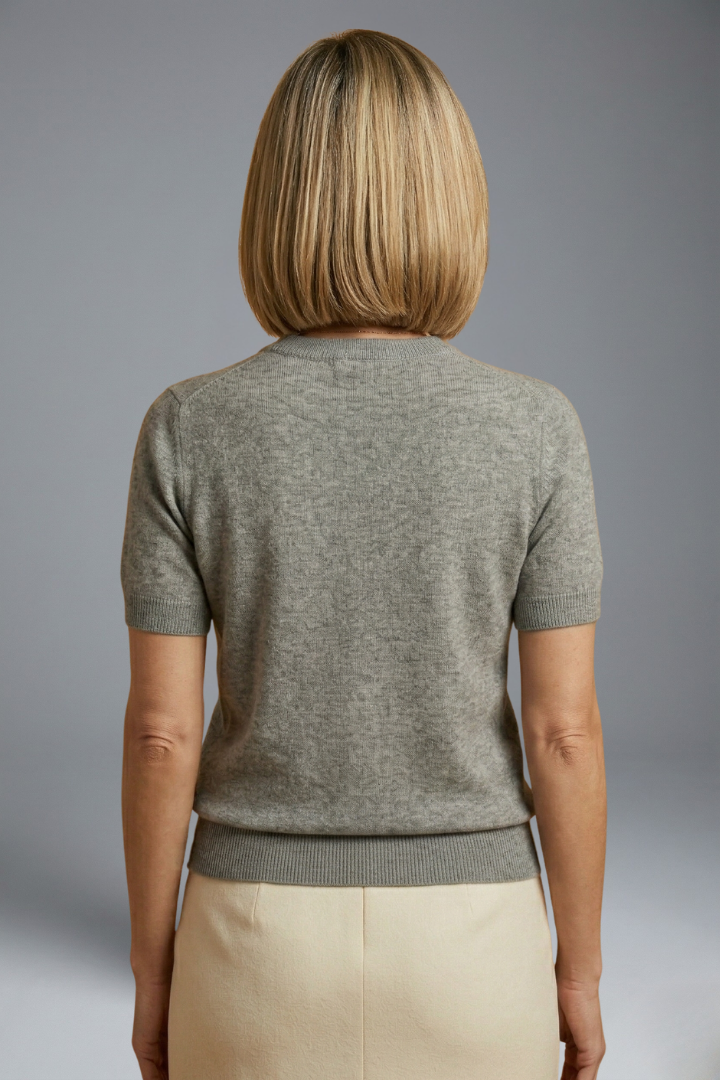 Soft solid color women's knit top with a classic crew neck & modern ribbed hem for daily comfort.