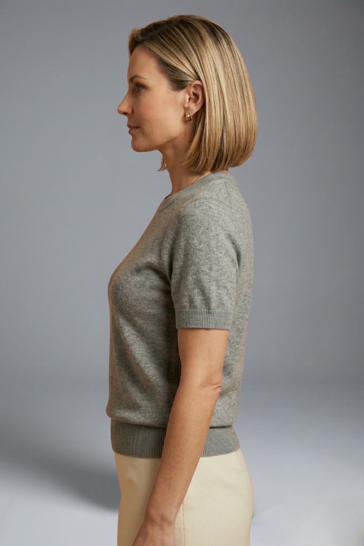 Stylish women's short sleeve crew neck top with ribbed hem, great for casual everyday outfitting.